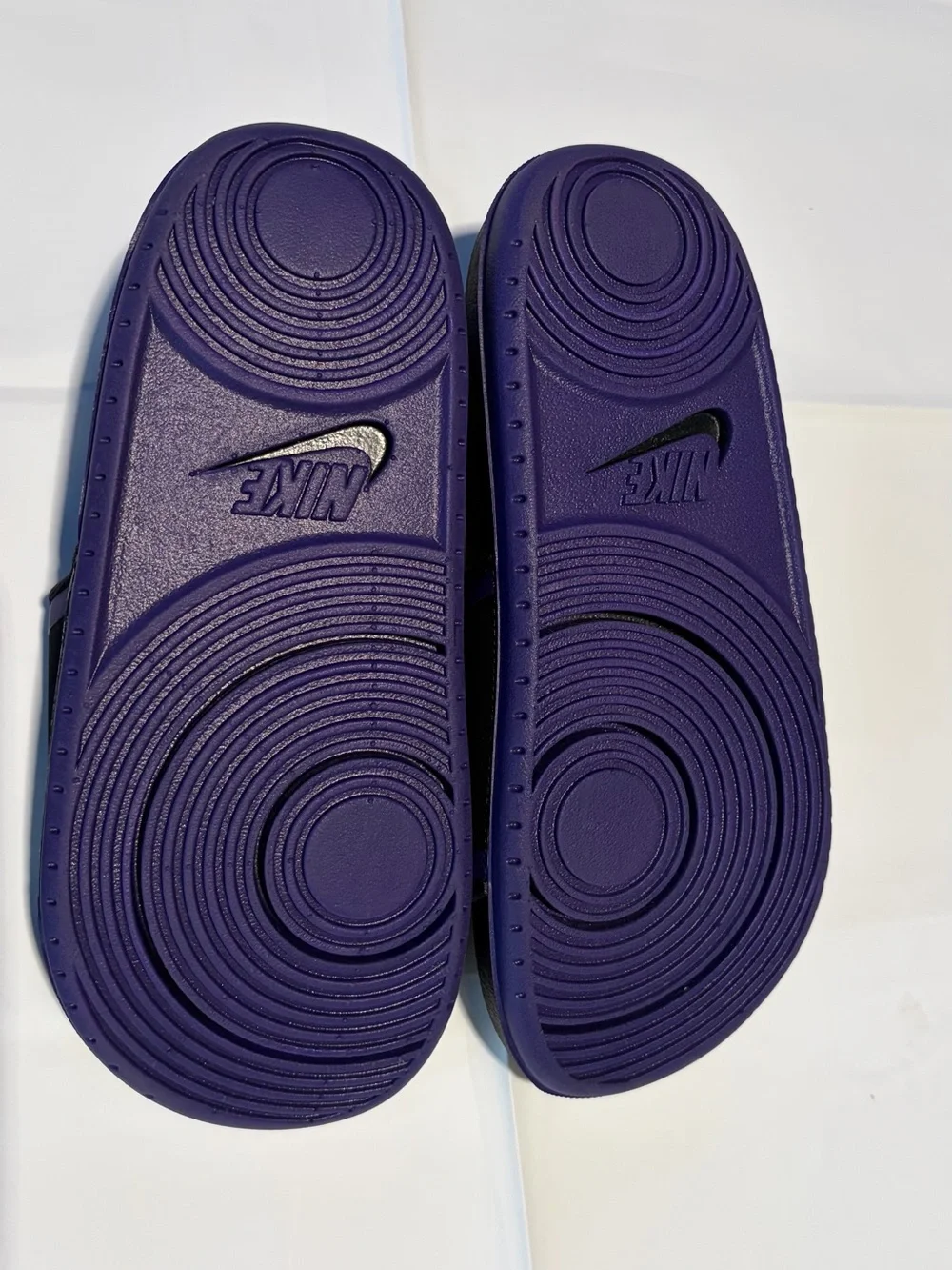 Nike Black Slide Sandals with Purple Trim and White Monster Graphic